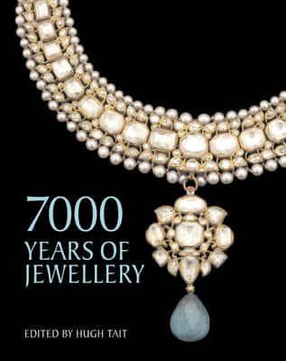 Cover image for '7000 years of jewellery' by Hugh Tait showing a pearl necklace with a blue stone pendant above the title text. 