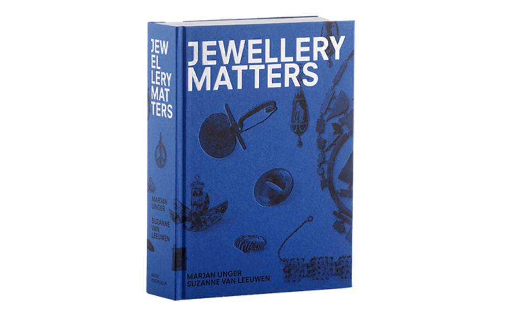 Cover image for 'Jewellery Matters' showing silhouetted jewels in black against a blue background. 