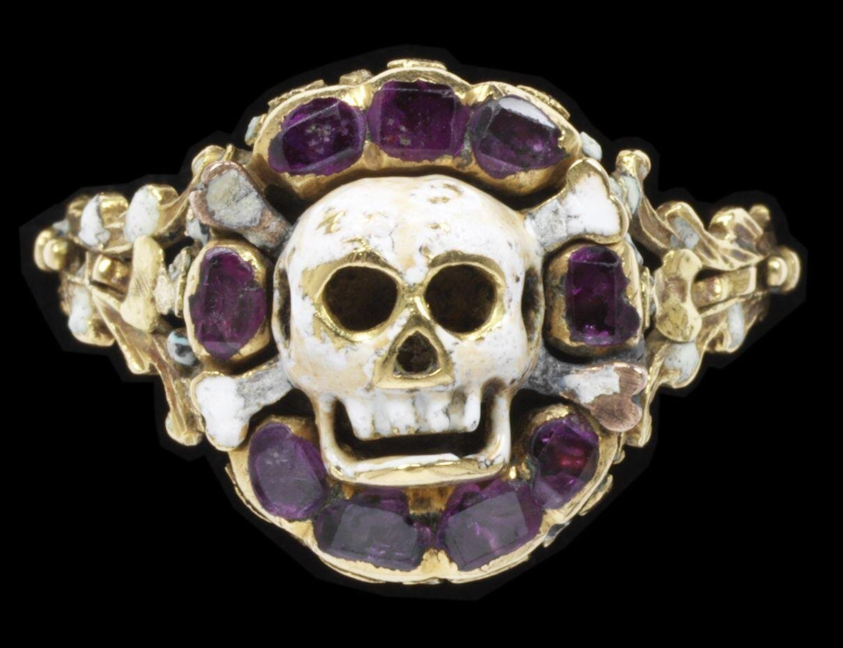 Image of ring with skull symbolising death.