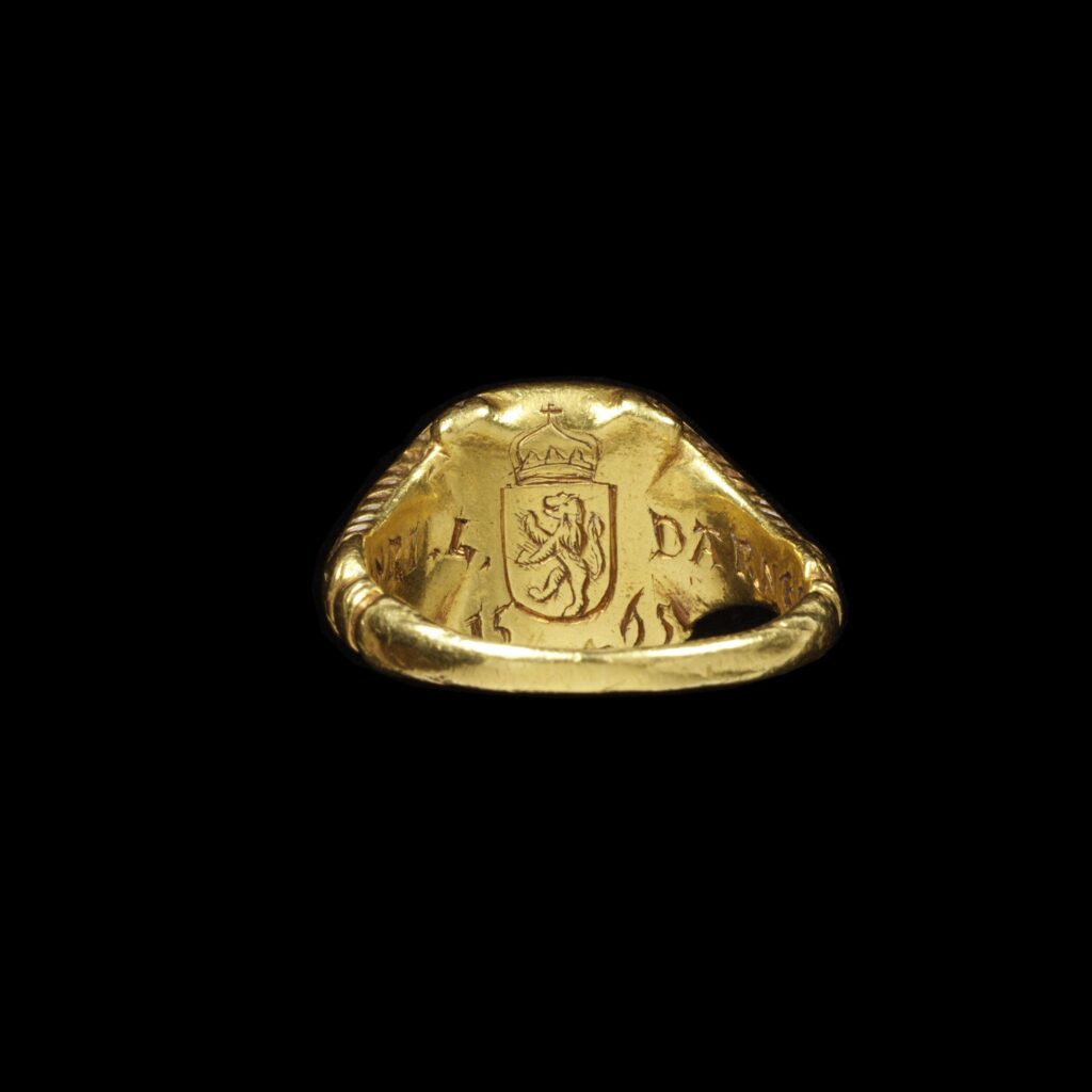 Back of 'Darnley' ring engraved with a coat of arms with a lion rampant and the inscription Henri L. Darnley.Part of Edmund Waterton's ring collection. 