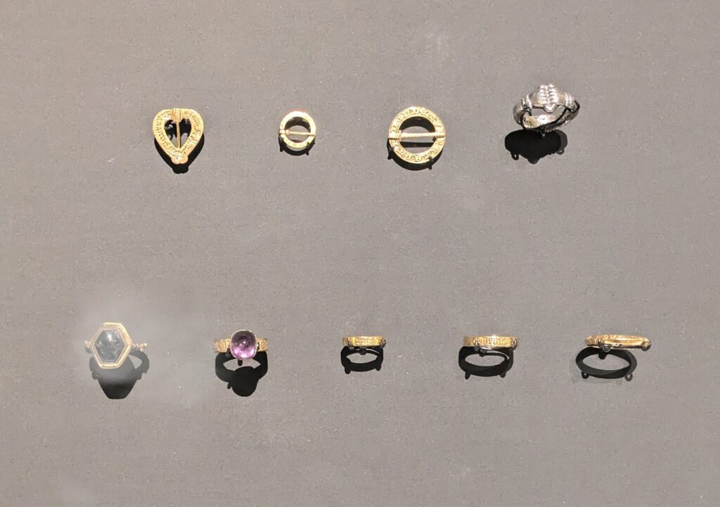 Two rows of jewels from the V&A Medieval and Renaissance galleries, demonstrating different fixing methods. 