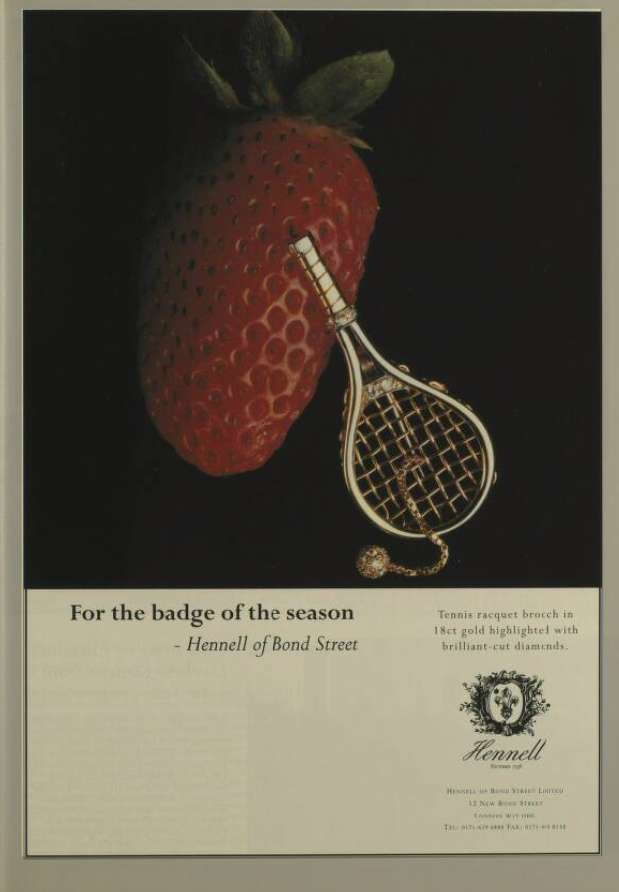 Advert for Hennell of Bond Street showing a large ripe strawberry and a gold tennis racket brooch with diamond set ball attached by a chain. 