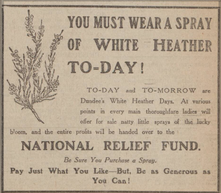 Neewspaper advert with an image of white heather and the text 'You must wear a spray of white heather today' as a fundraiser for the National Relief Fund. 