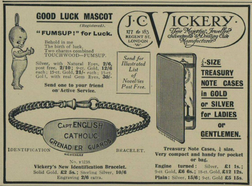 Advert from the Illustrated London News, May 13, 1916. Showing a range of jewellery by J.C. Vickery including a lucky token Fumsup doll, a metal  bracelet with an identification disc and a treasury note case to hold bank notes. 