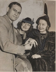 Actress Alice White with divorce attorney Milt Gooden, 1938
